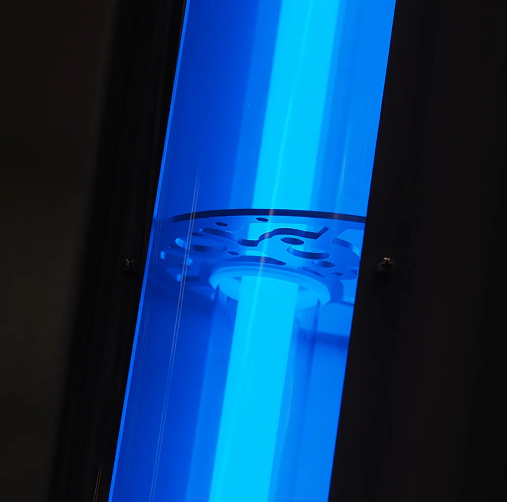 Furnace igniter not glowing and pilot won't light in Lucia, NC: close-up of a blue ultraviolet lamp glowing inside enclosed